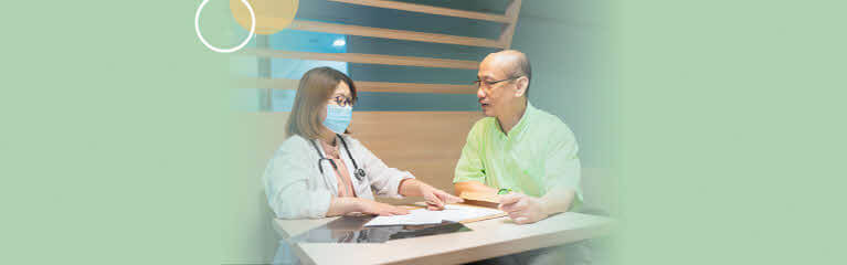 Doctor talking to patient in the clinic