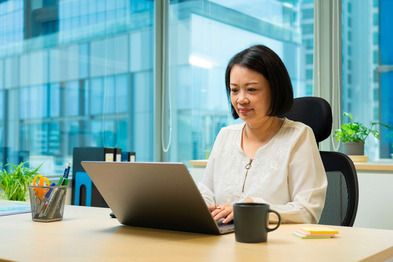 Woman looking at a laptop