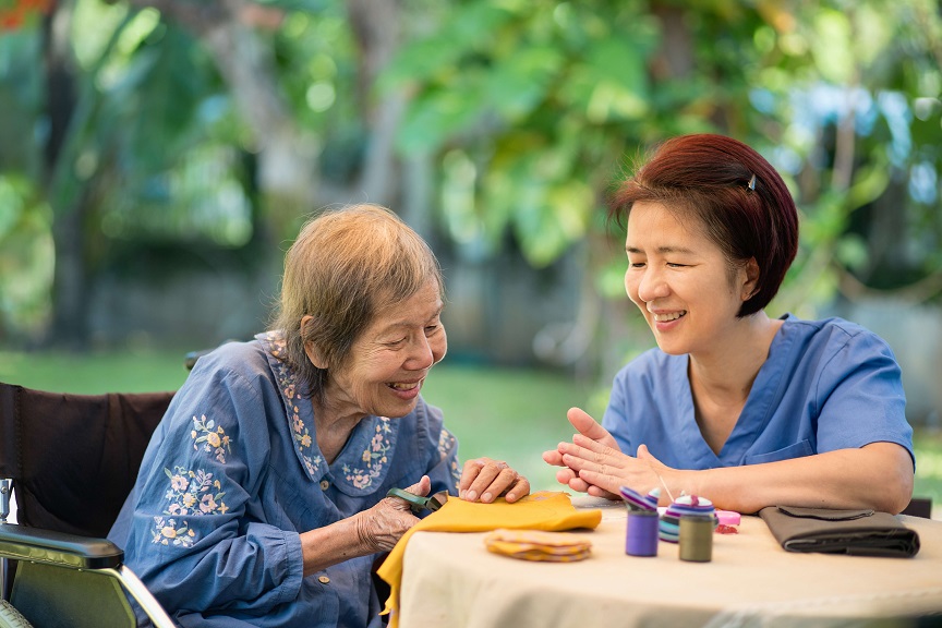 Caregiver and care recipient in the garden together