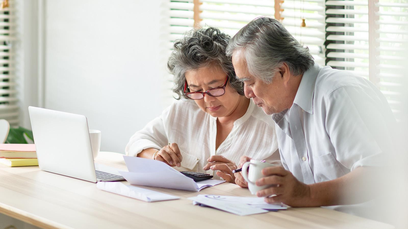 Old couple planning for their finances.