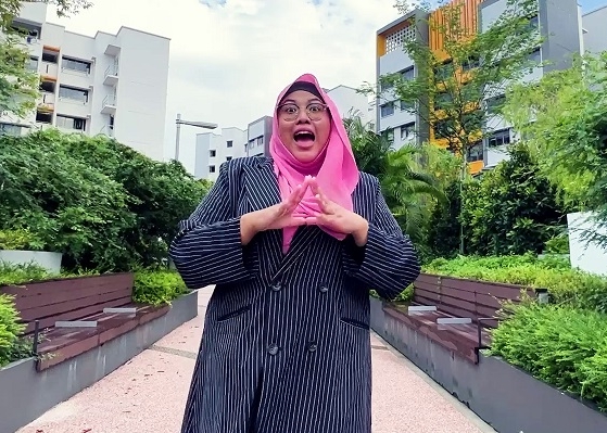 property agent tina starting a home tour at a hdb estate