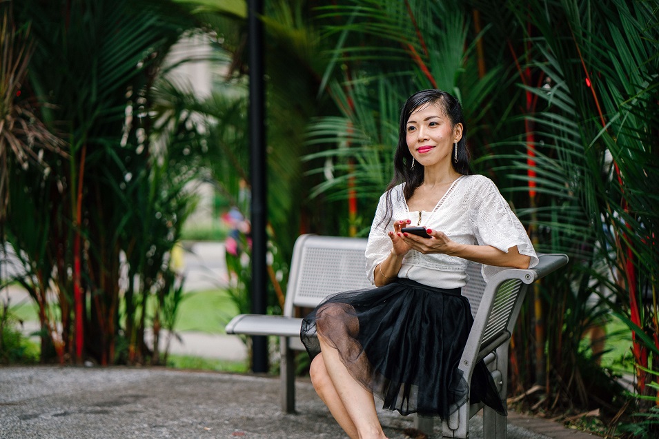 Lady sitting in a park