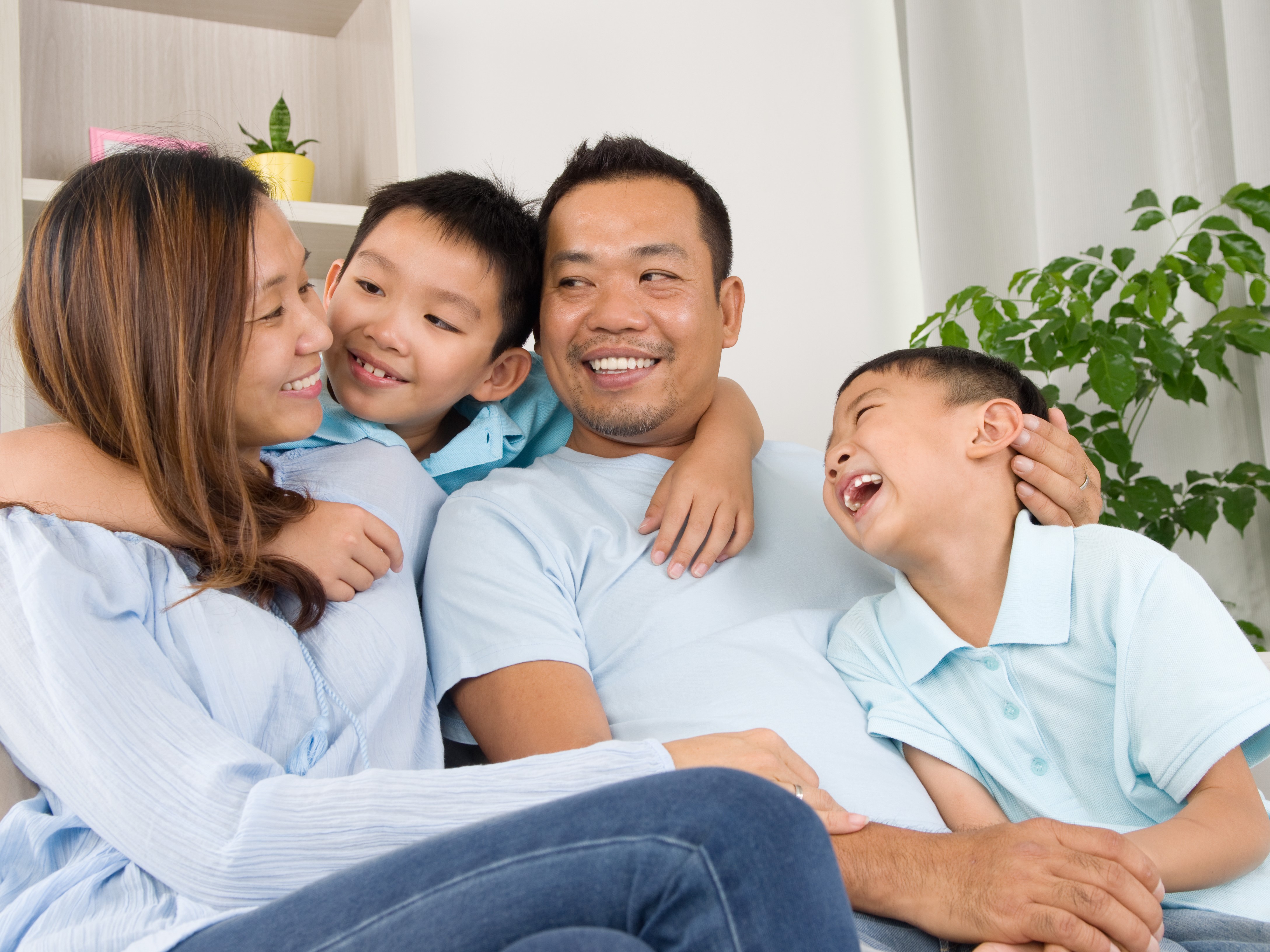 asian family smiling together