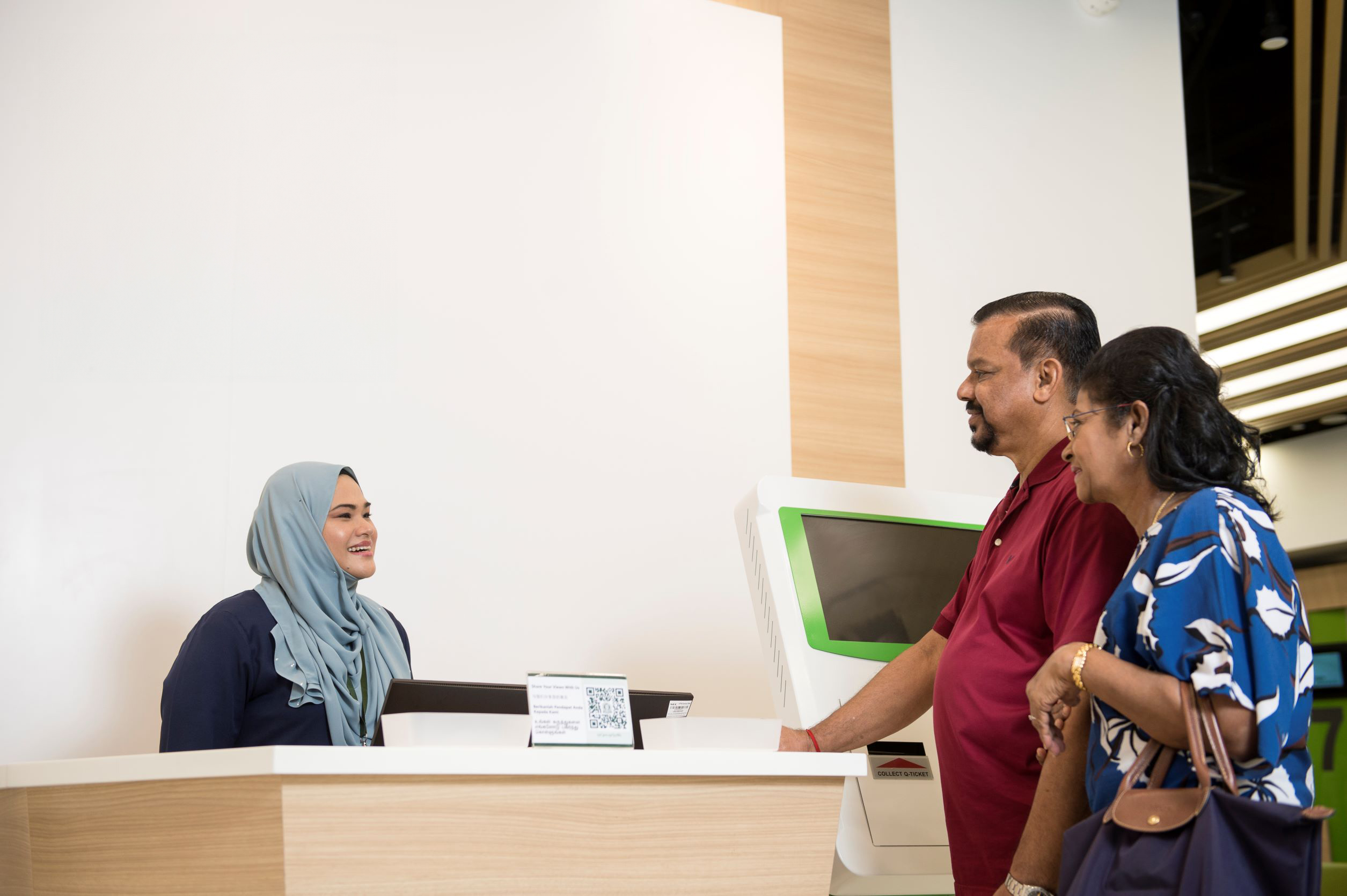 Senior couple visiting service centre