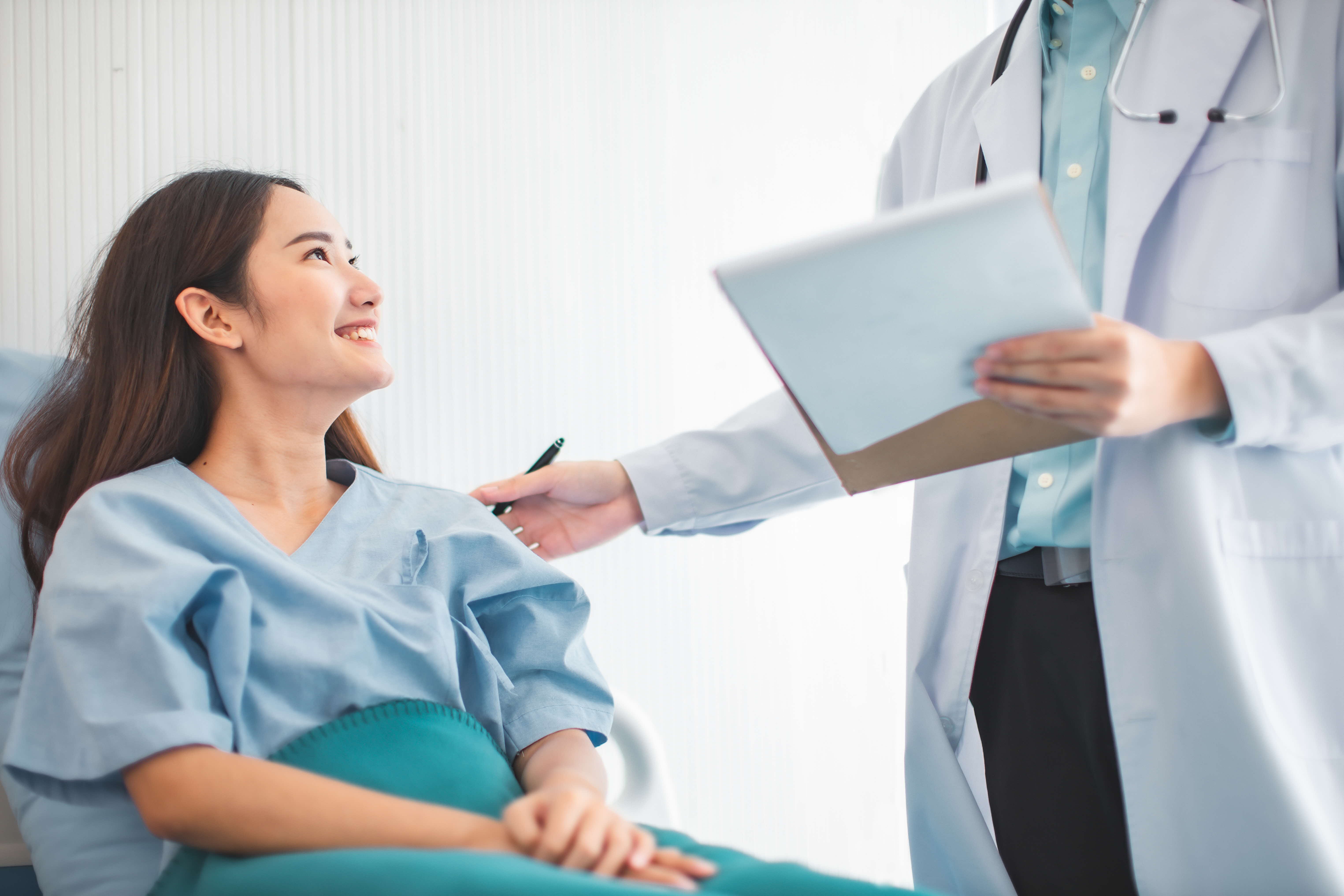 young female patient listening to her doctor